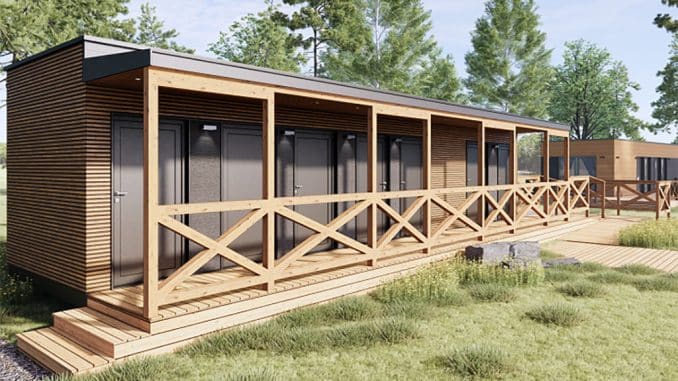 Sanitärgebäude mit viel Holz von CamperClean