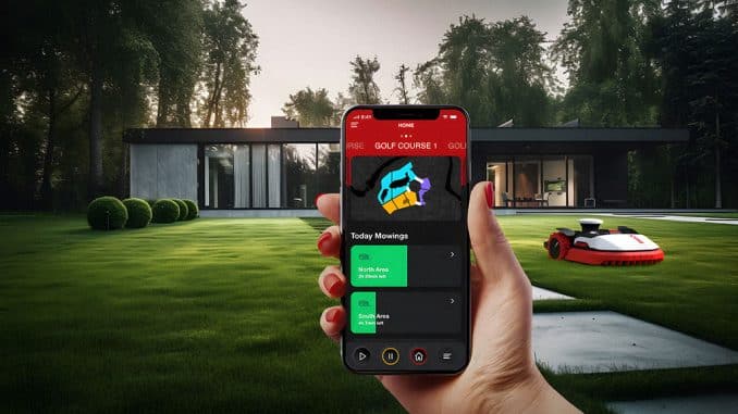 Smarter Mähroboter von Kress auf einem Rasen vor einem Haus. Im Vordergrund eine Hand mit Handy, die das Bedienmenü vom Mähroboter zeigt.