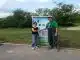Mann und Frau vor einer CamperClean-Station im Freien.
